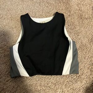 dark green, white, and black girls zara sports top